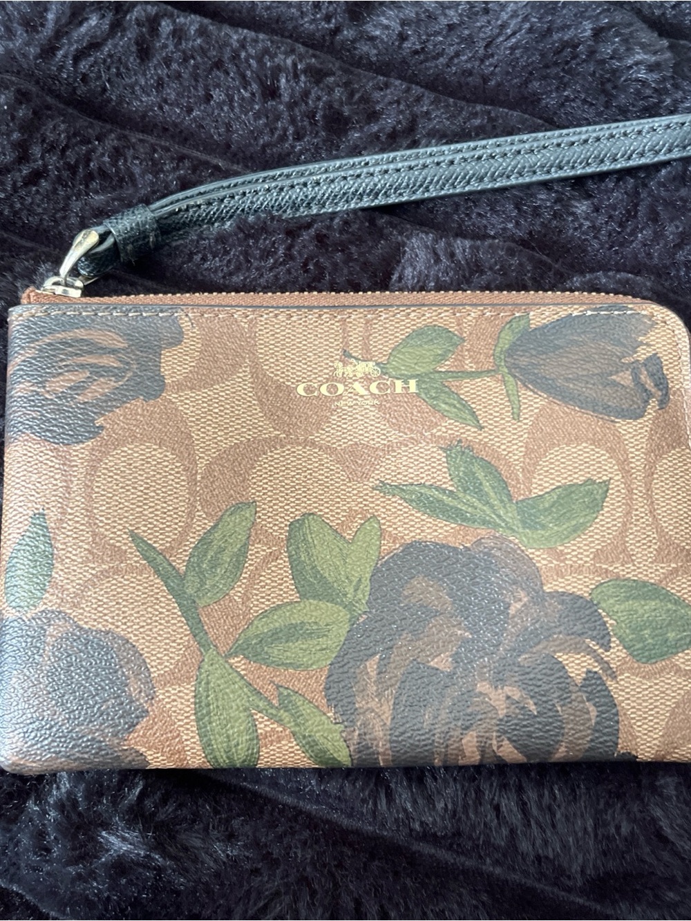 COACH Brown Signature Floral Wristlet with Black Strap